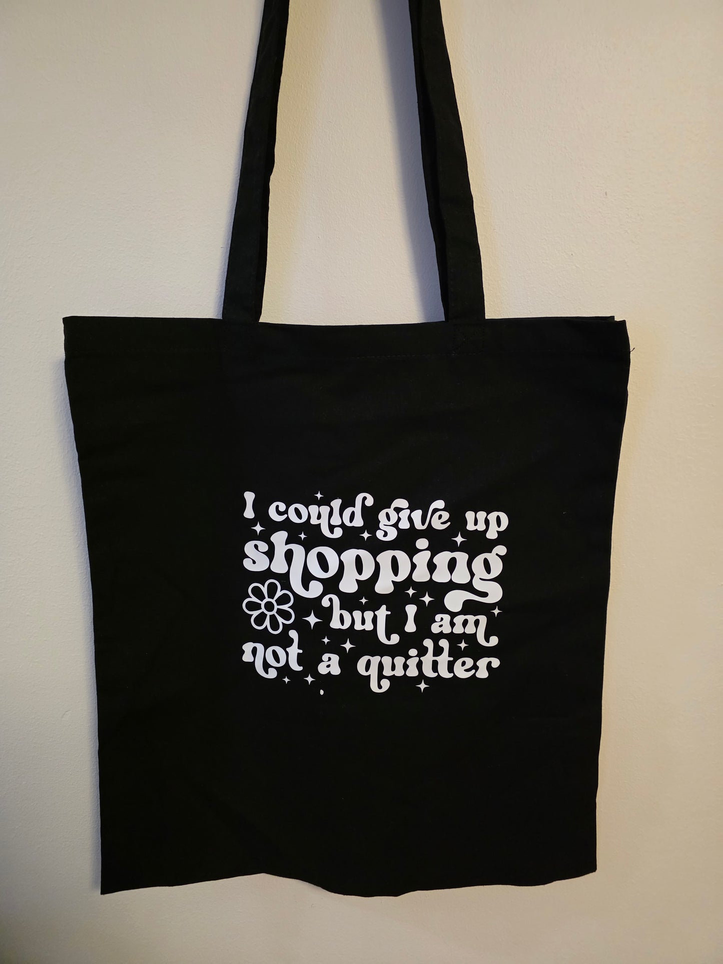 "I Could Give Up Shopping... But I'm Not a Quitter" Black Tote Bag